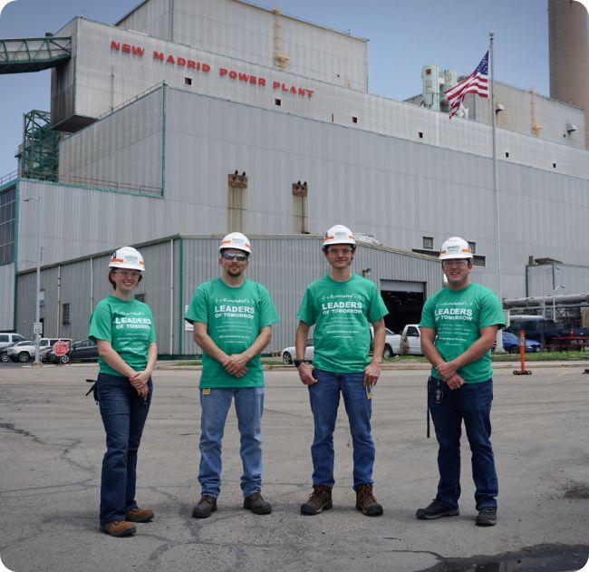 Interns outside building