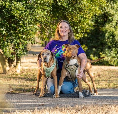 Lady with two dogs outside
