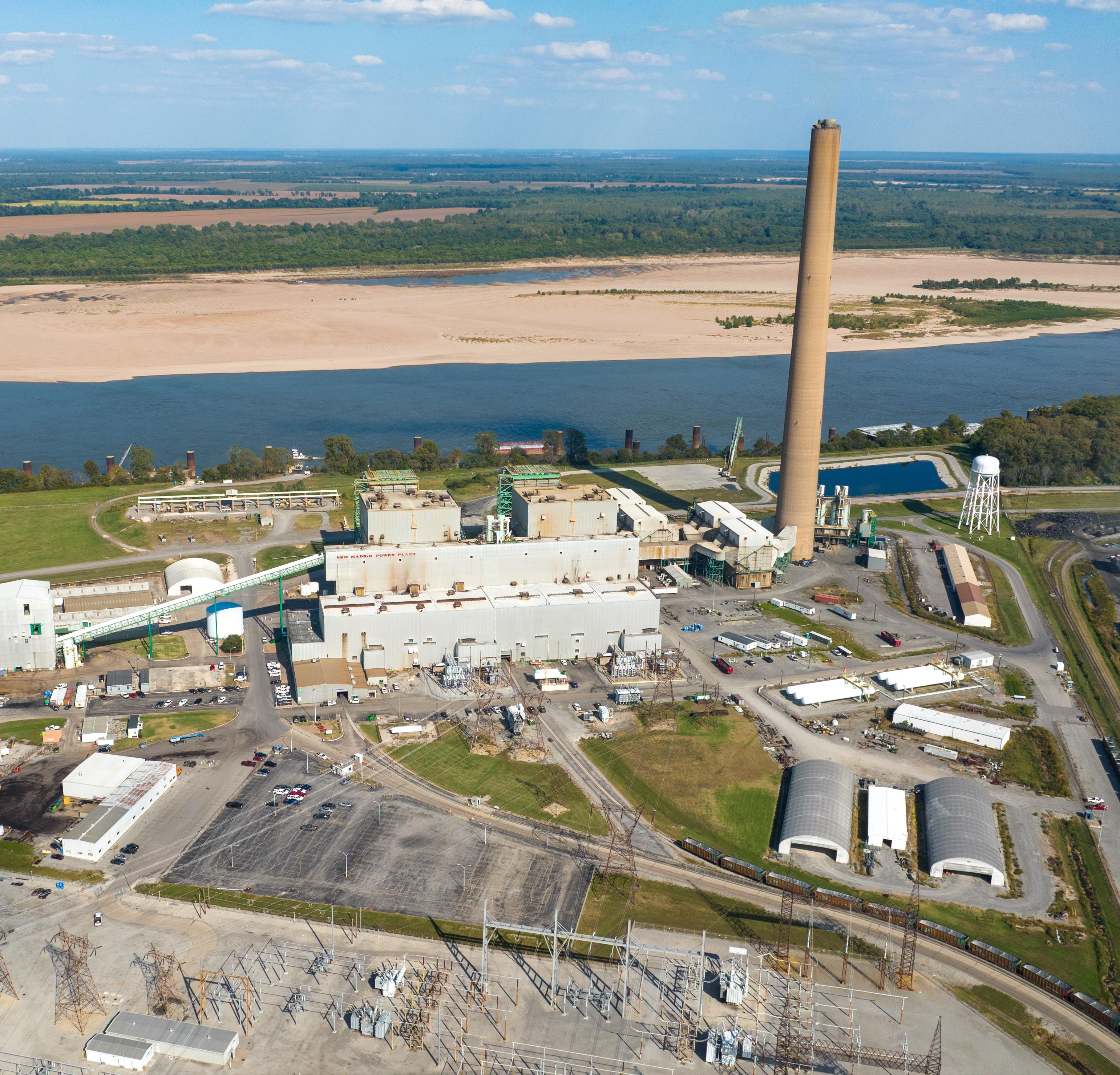aerial view of power plant on banks of Mississippi River