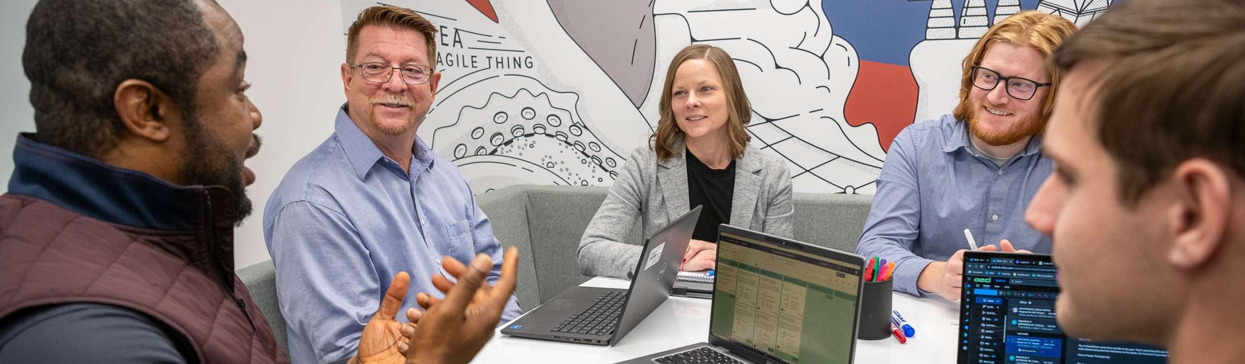 employees working together in a meeting room